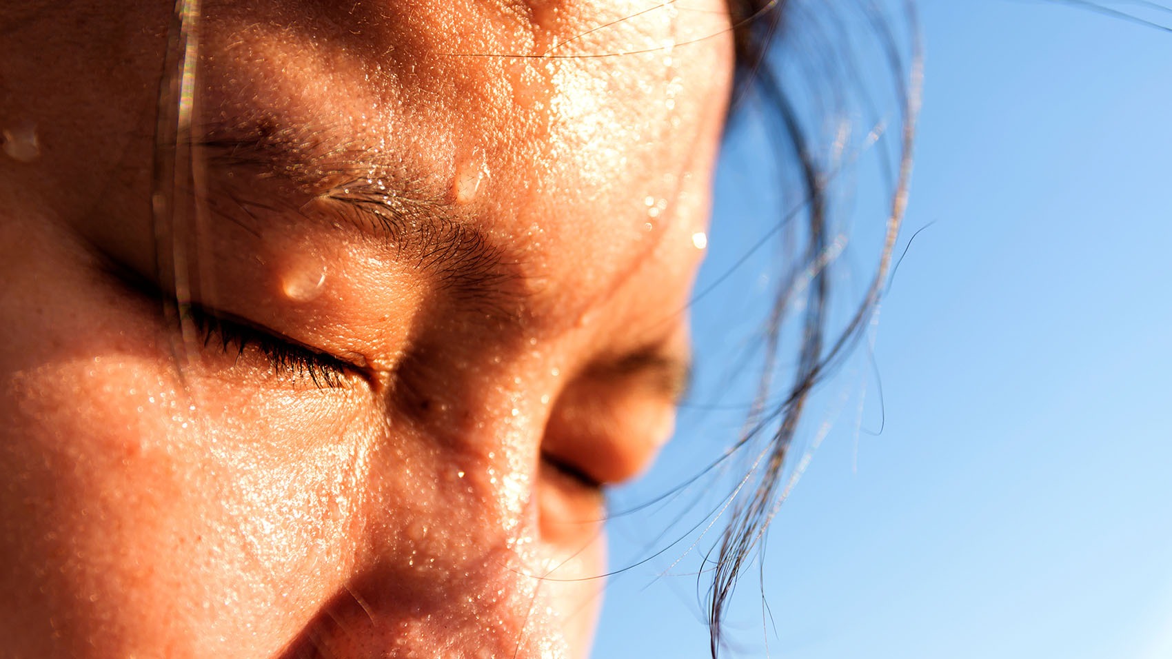 closeup sweating on face of asian women . Concept healty and Ex
