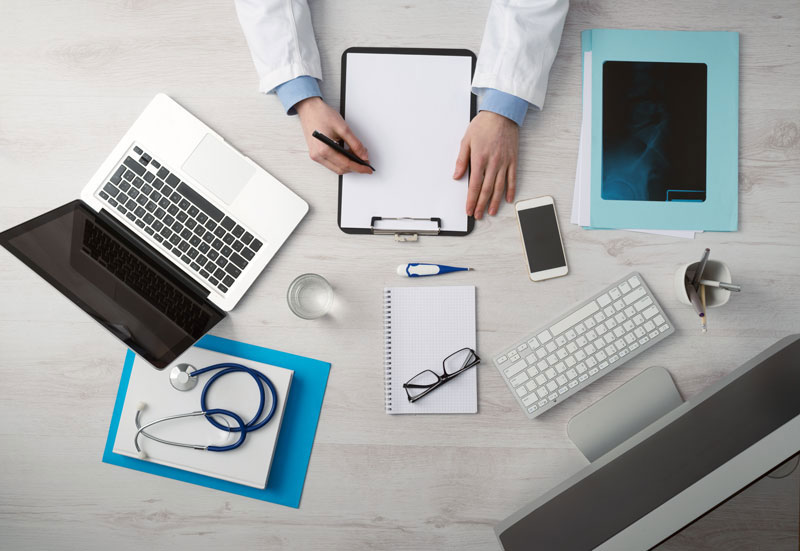 A Doctor Takes Notes