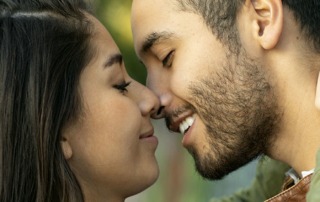 Young couple about to kiss